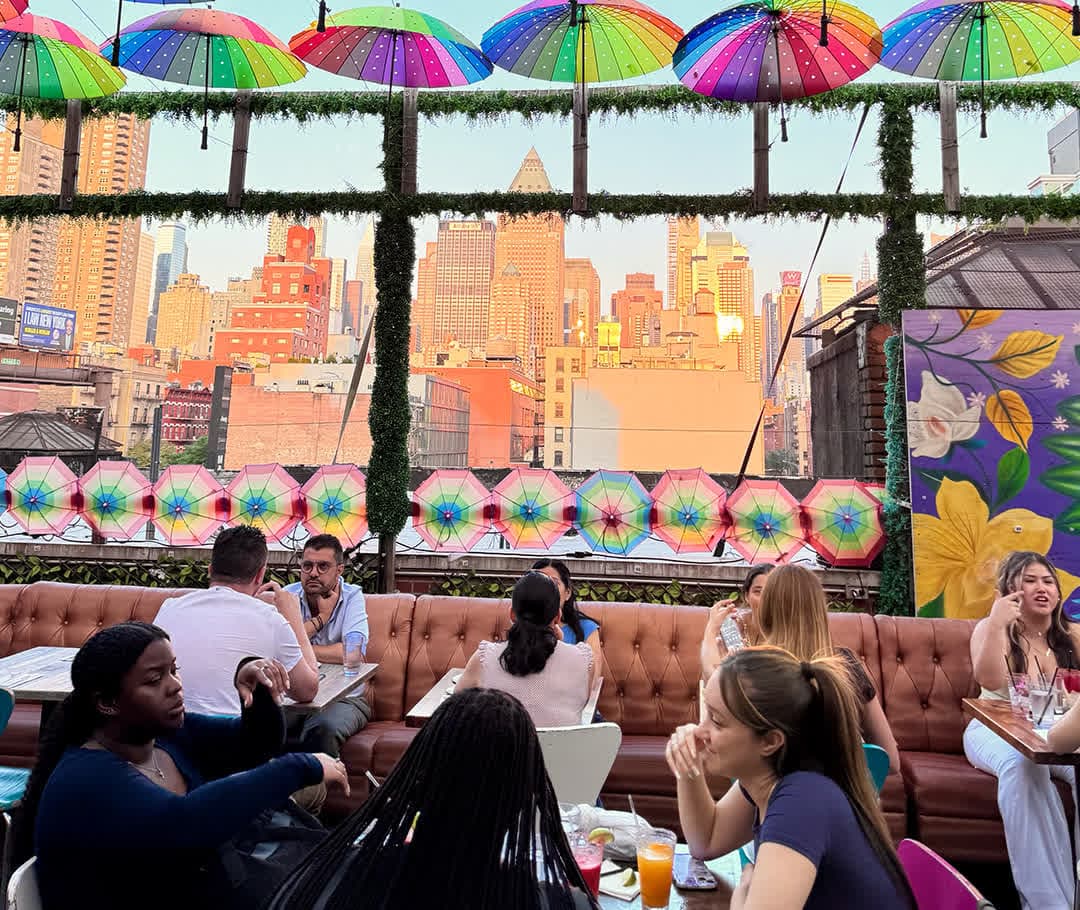 Golden hour Manhattan skyline seen from the Cantina Rooftop terrace