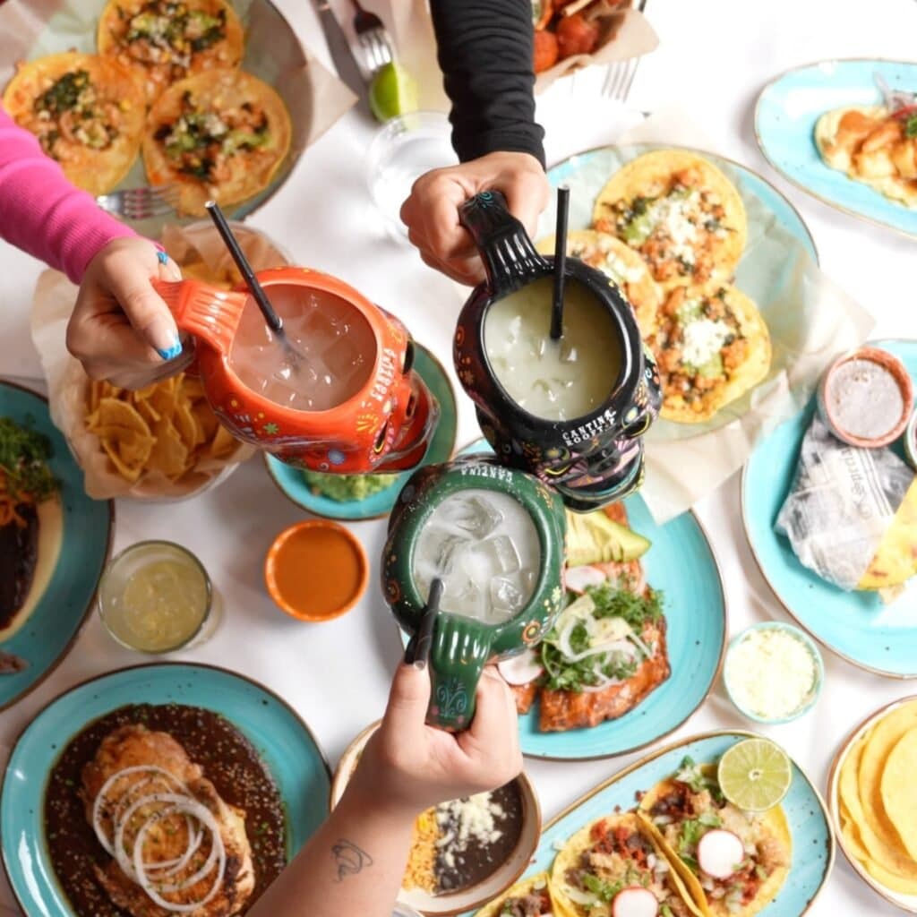 Large party celebrating at Cantina Rooftop
