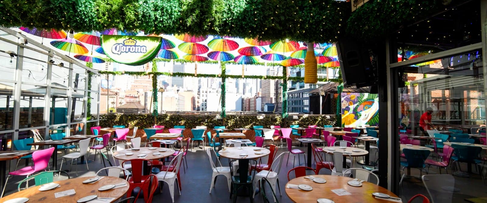 Open-air terrace with the city through the retractable roof